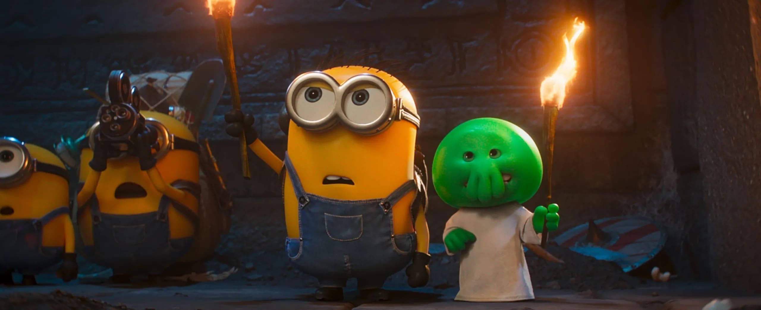 A minion and a monster from Illumination's MINIONS & MONSTERS.